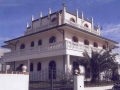 italian stone villa balustrades columns windows surrounds chimneys